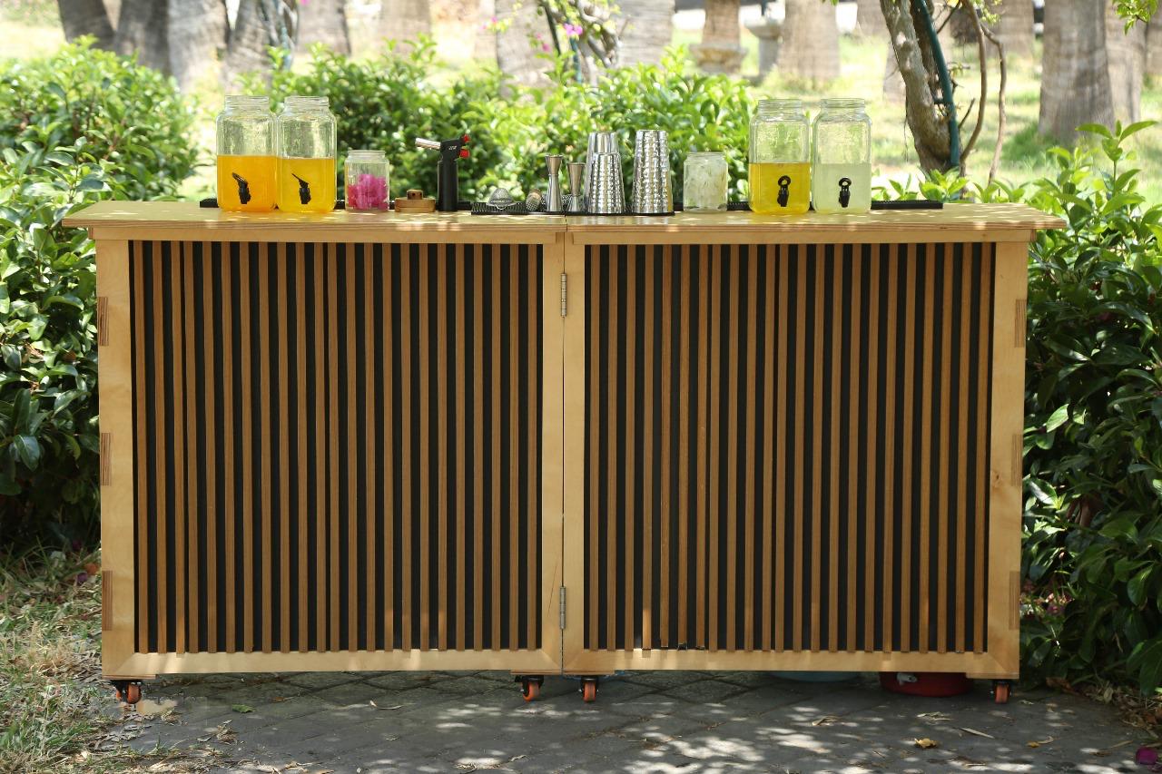 The Kaizen Station foldable bar set up for an event