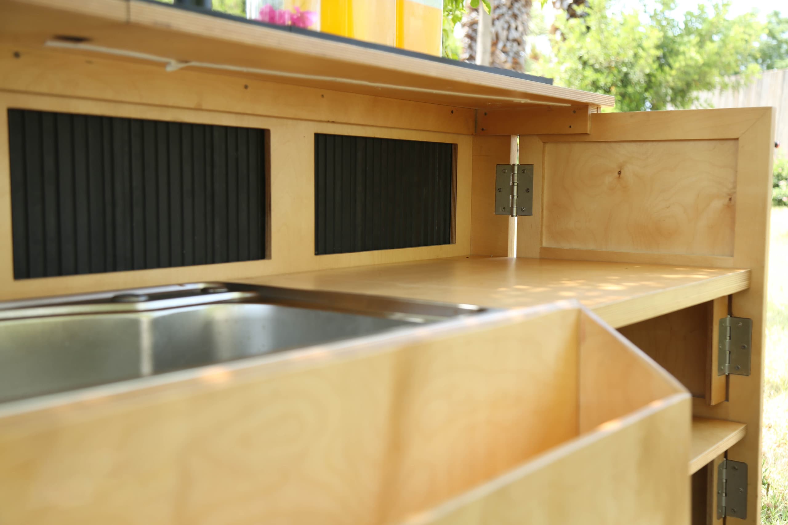 Close-up of the working sink and cutting board work surface